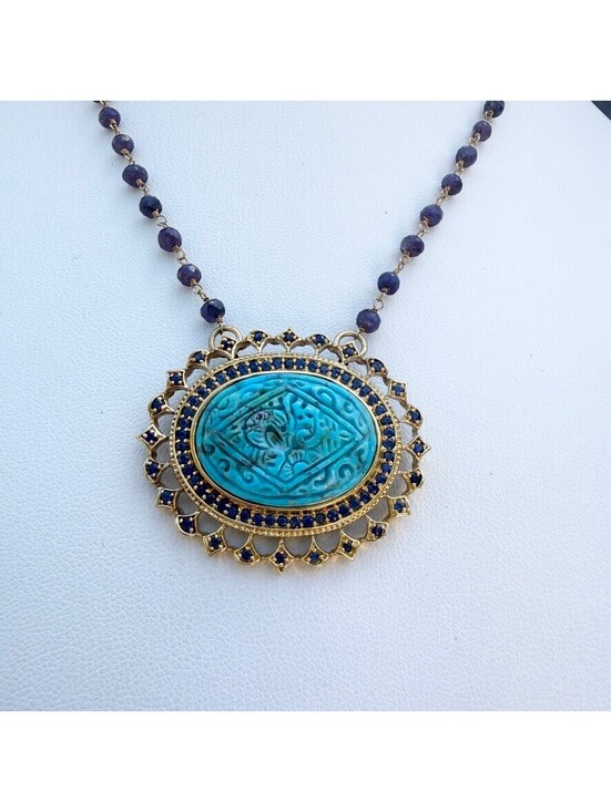 Jewelry - Turquoise carved bird pendant necklace. Wire wrapped amethyst small stones.